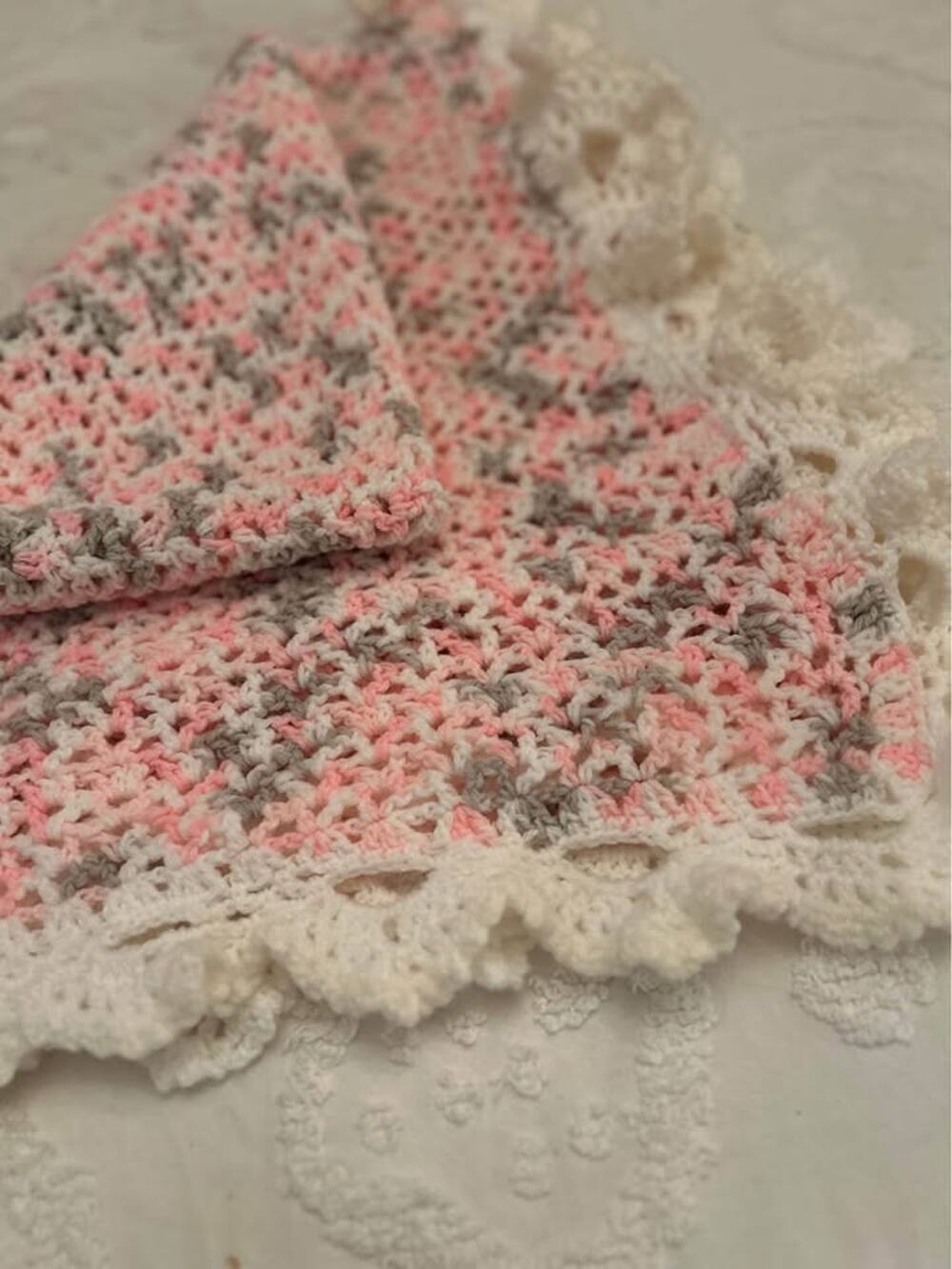 Handmade Crochet Baby Blanket – Soft Pink, Gray & White with Ruffle Trim